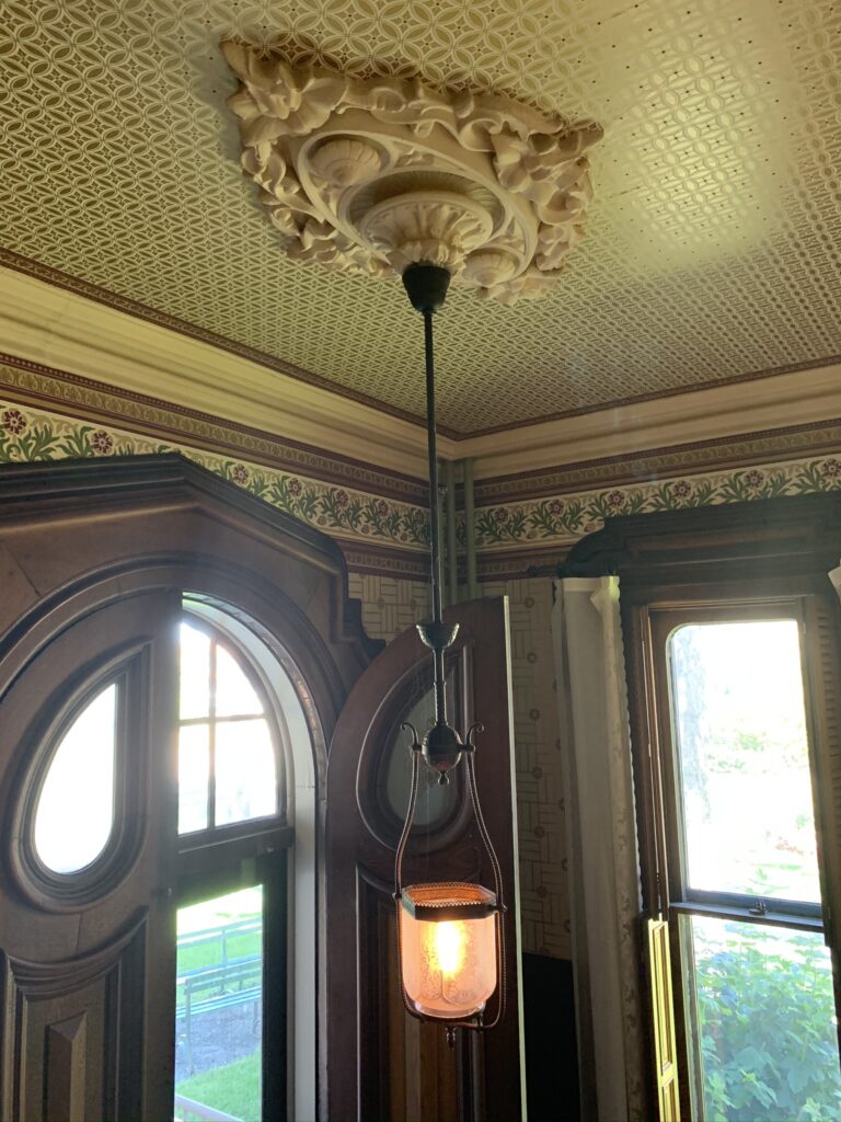 Cappon House entryway light and ceiling medallion