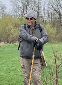 Picture of Rick Bosch. Rick volunteers for the Holland Museum as a researcher and a docent and for the Ottawa County Parks.  He is also active in the efforts to clean up the Lake Macatawa watershed.  