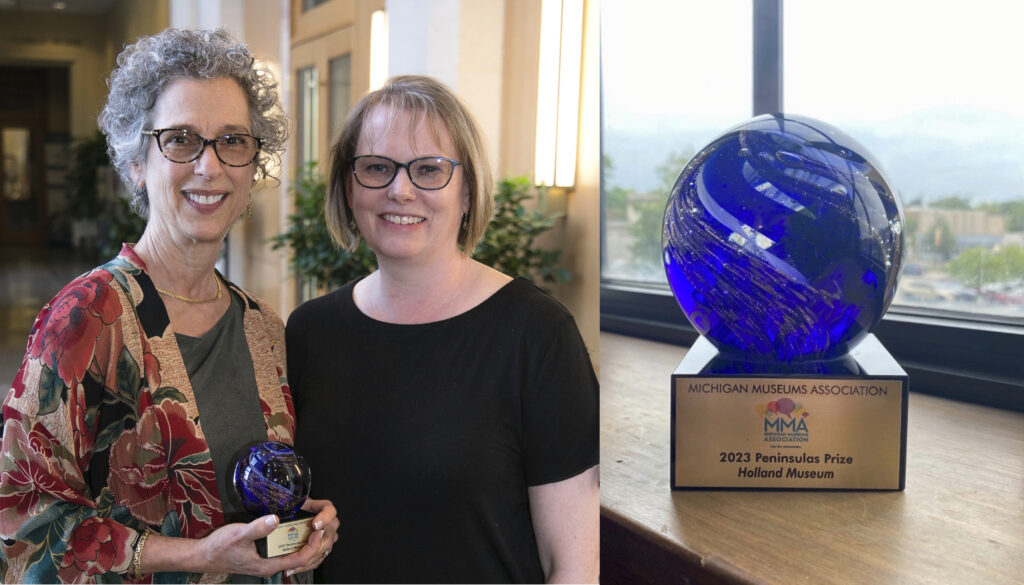 Picture of Ricki Levine, Holland Museum Executive Director, and Michelle Stempien, Holland Museum Education & Community Programs Manager with the Peninsulas Award for DEAI presented by Michigan Museum Association at the annual awards celebration in May 2023.